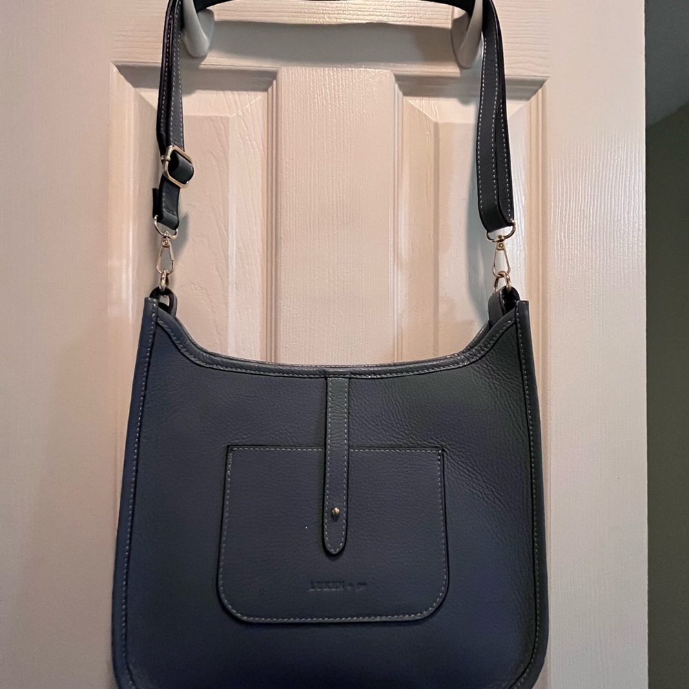 Blue Shoulder Bag with Adjustable Strap and Textured Material